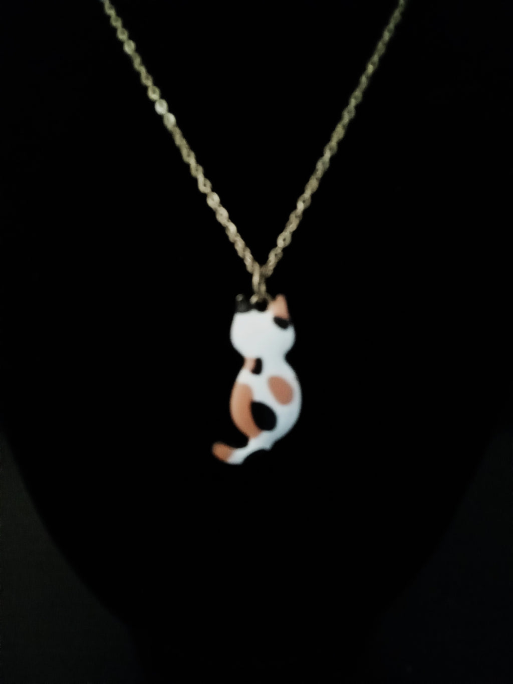 Orange, Black, and White Spotted Cat Necklace